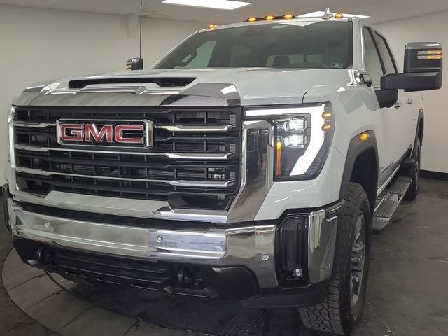 2026 GMC Sierra 2500 HD SLT in Glacier White Tricoat — front three-quarter view