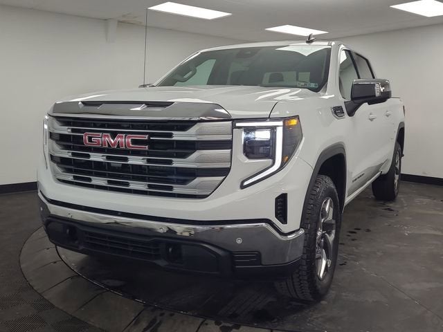 2026 GMC Sierra 1500 SLE in Summit White — front three-quarter view