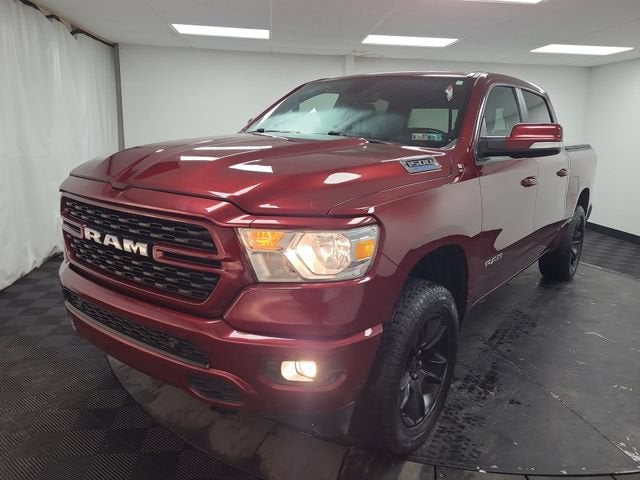 2022 RAM 1500 Big Horn in Red — front three-quarter view