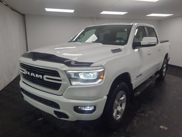 2021 RAM 1500 Big Horn in White — front three-quarter view