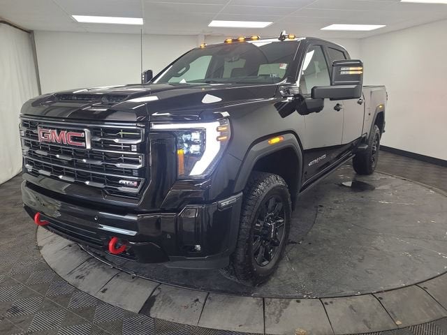 2025 GMC Sierra 2500 HD AT4 in Onyx Black — front three-quarter view