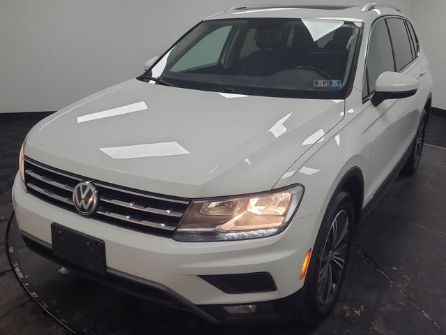 2018 Volkswagen Tiguan SEL in White — front three-quarter view